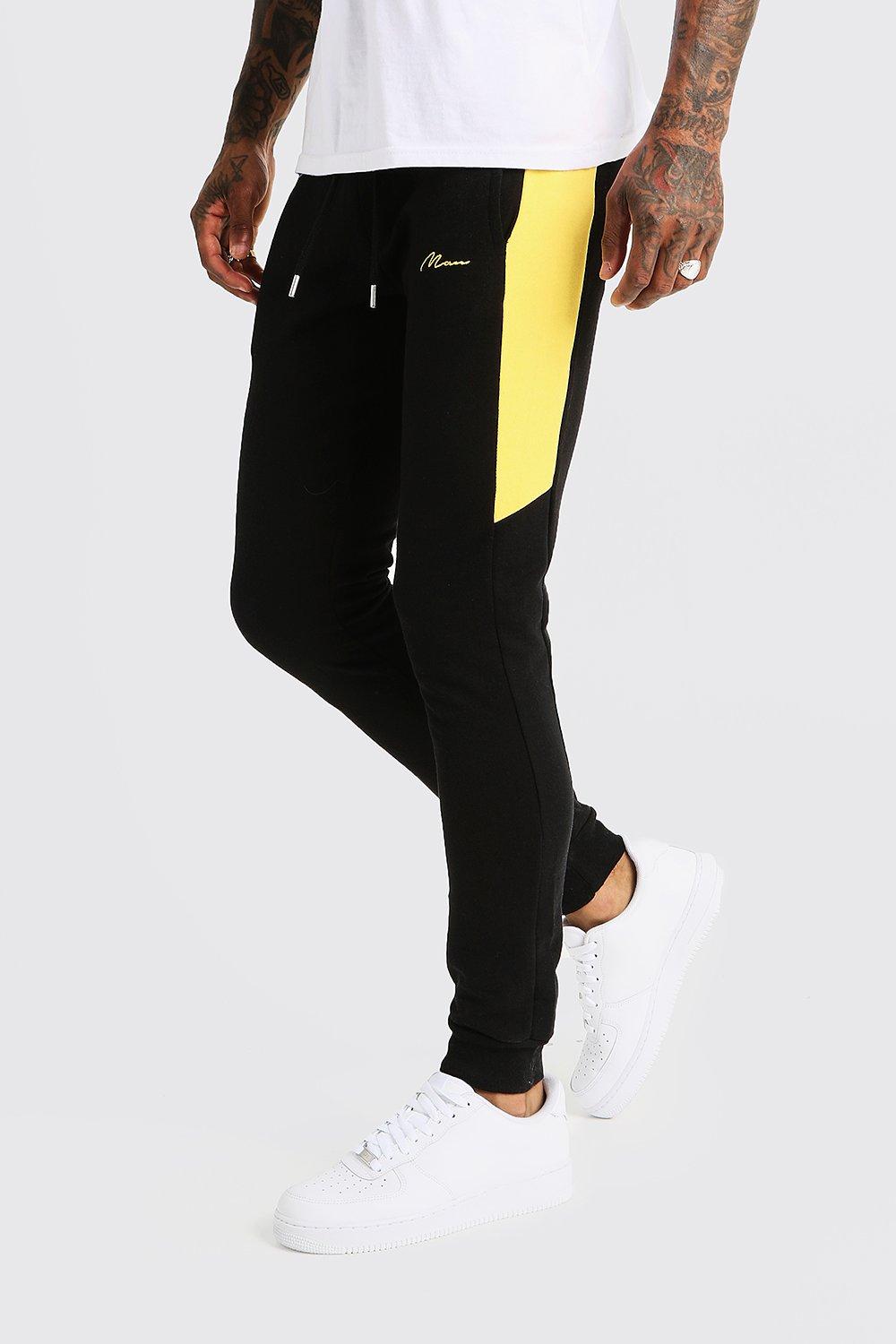 half red half black joggers
