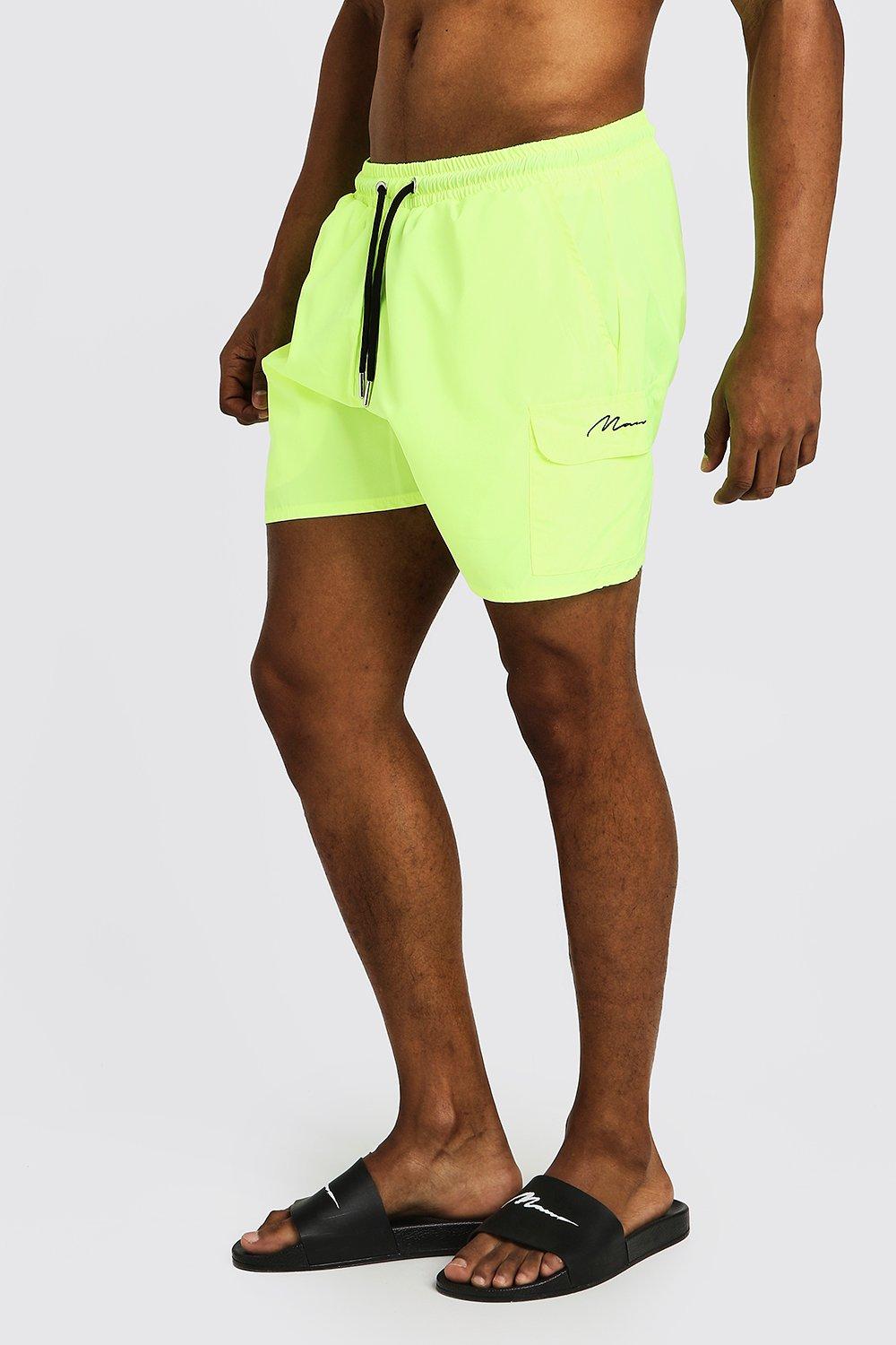 neon yellow swim shorts