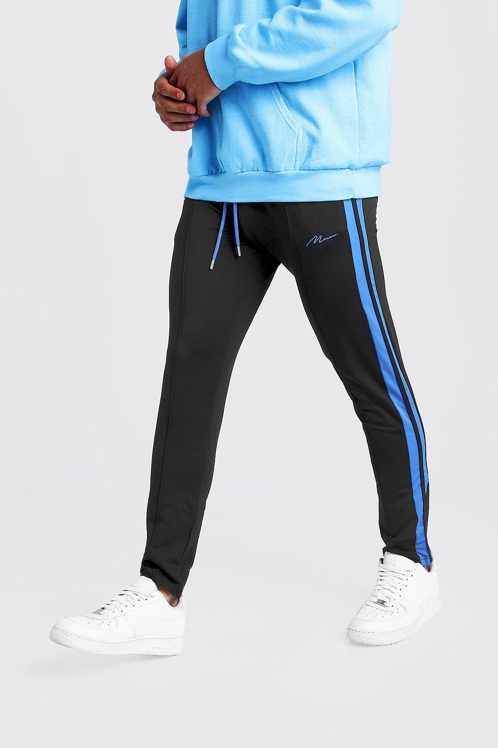 black joggers with blue stripe