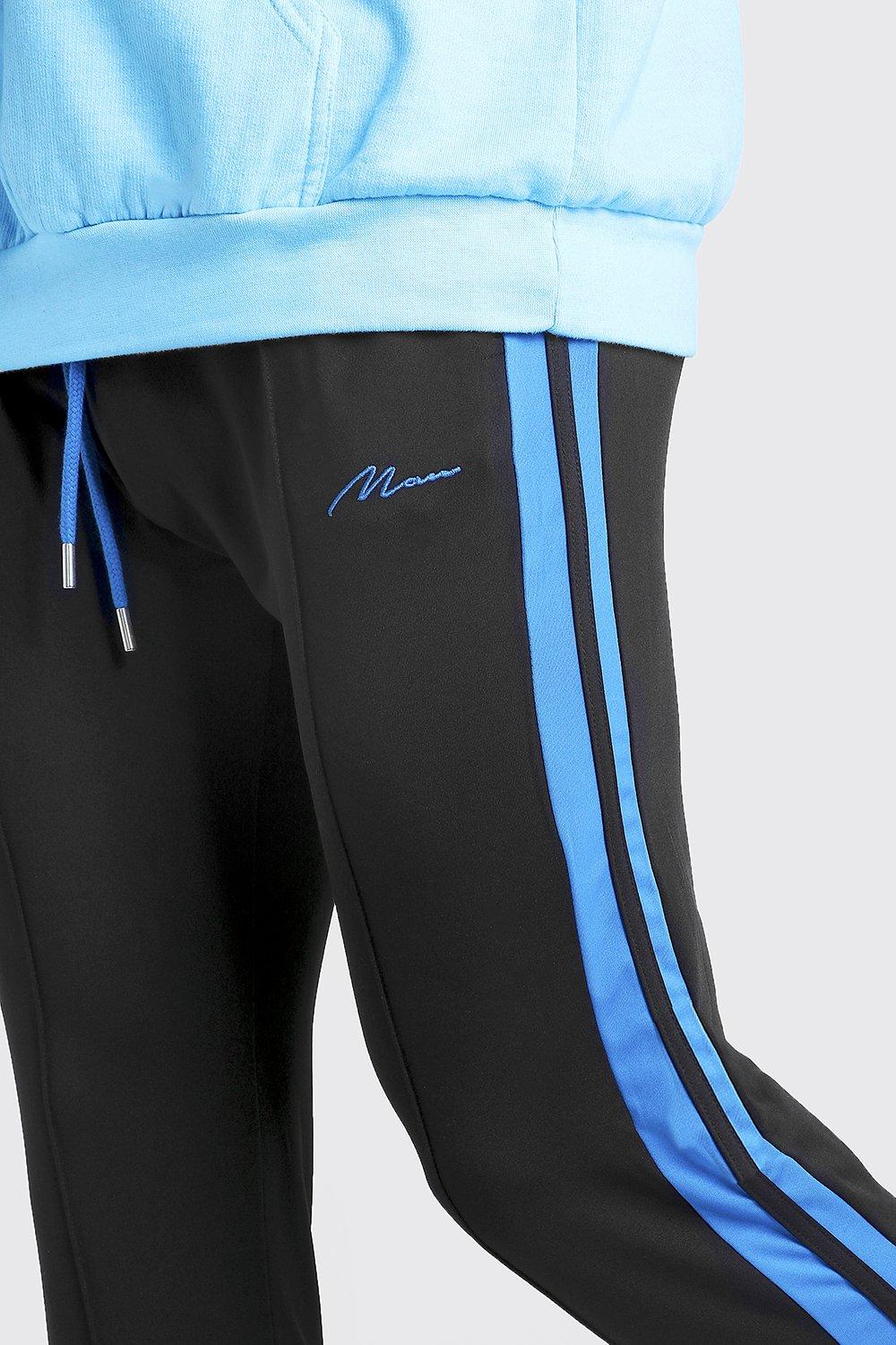 black joggers with blue stripe