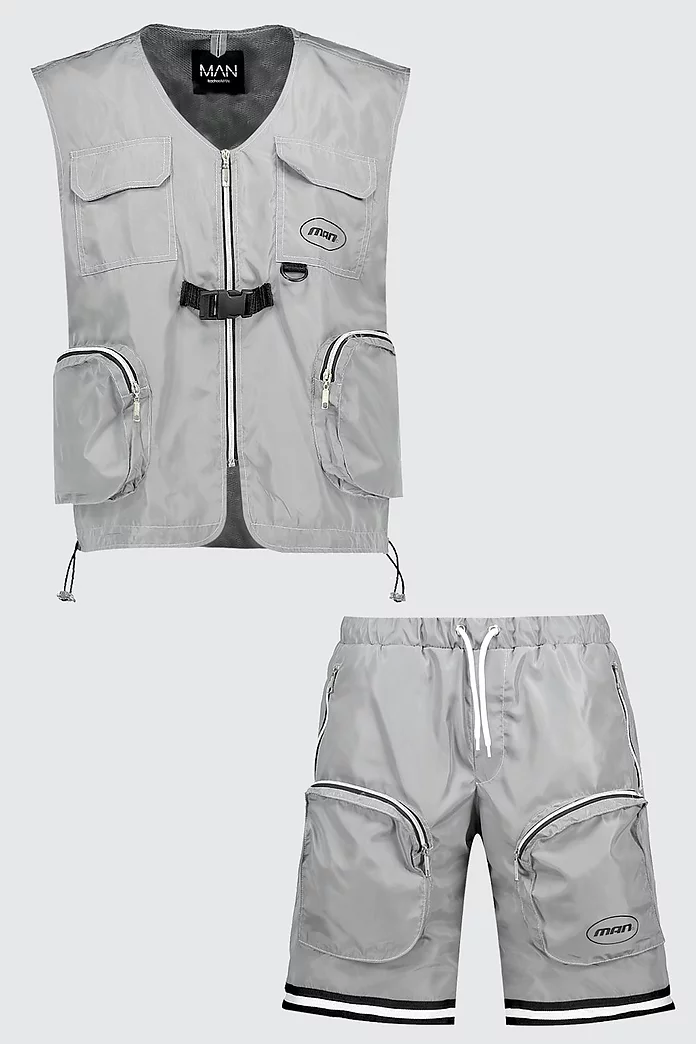 olive utility vest, gray tee, denim cutoff shorts, Sam Edelman