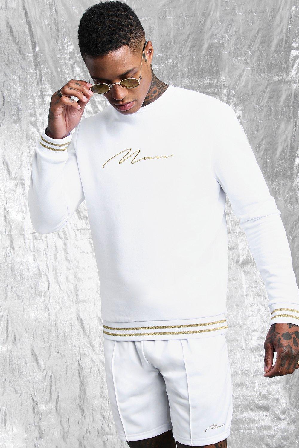 white and gold tracksuit