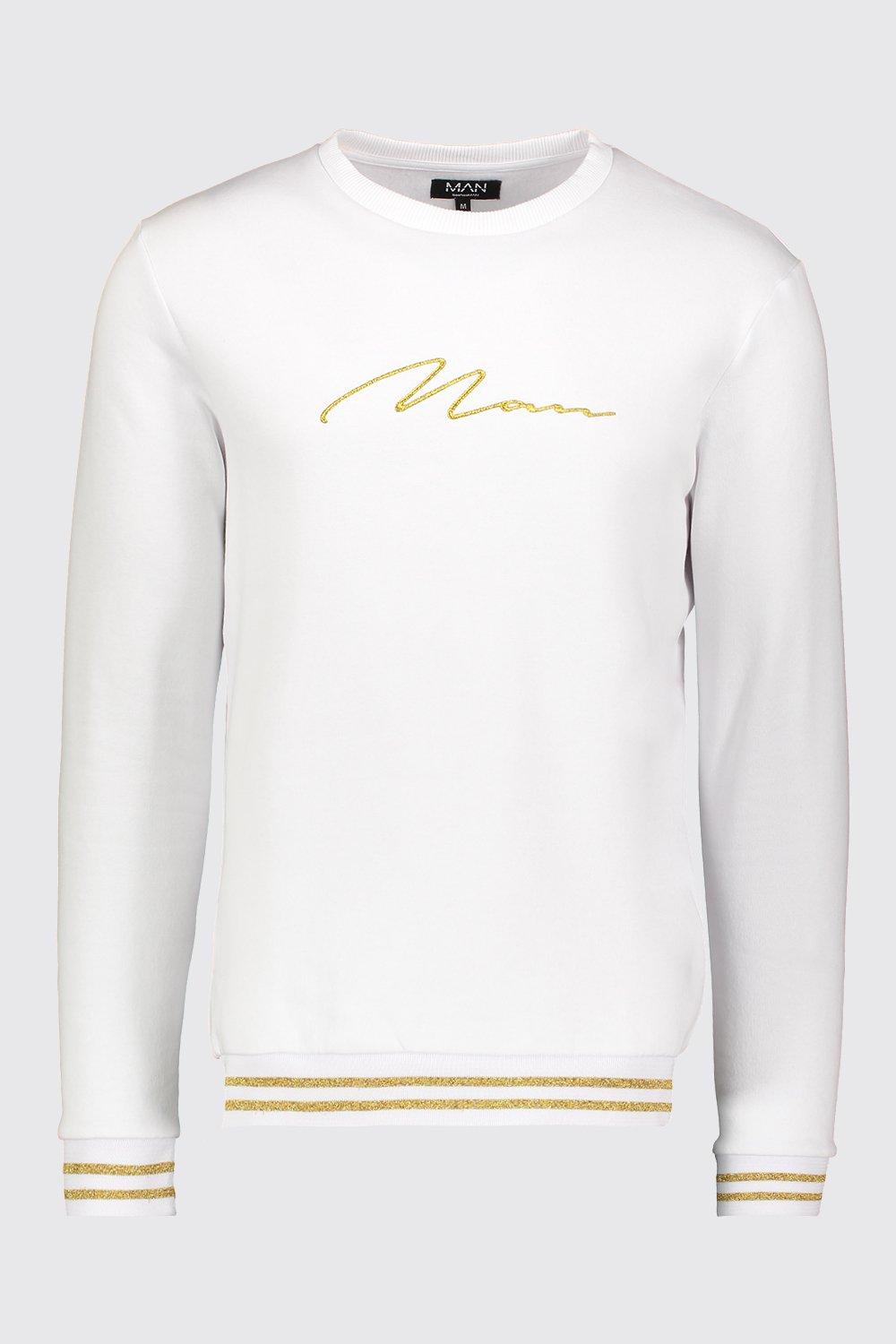 white and gold tracksuit