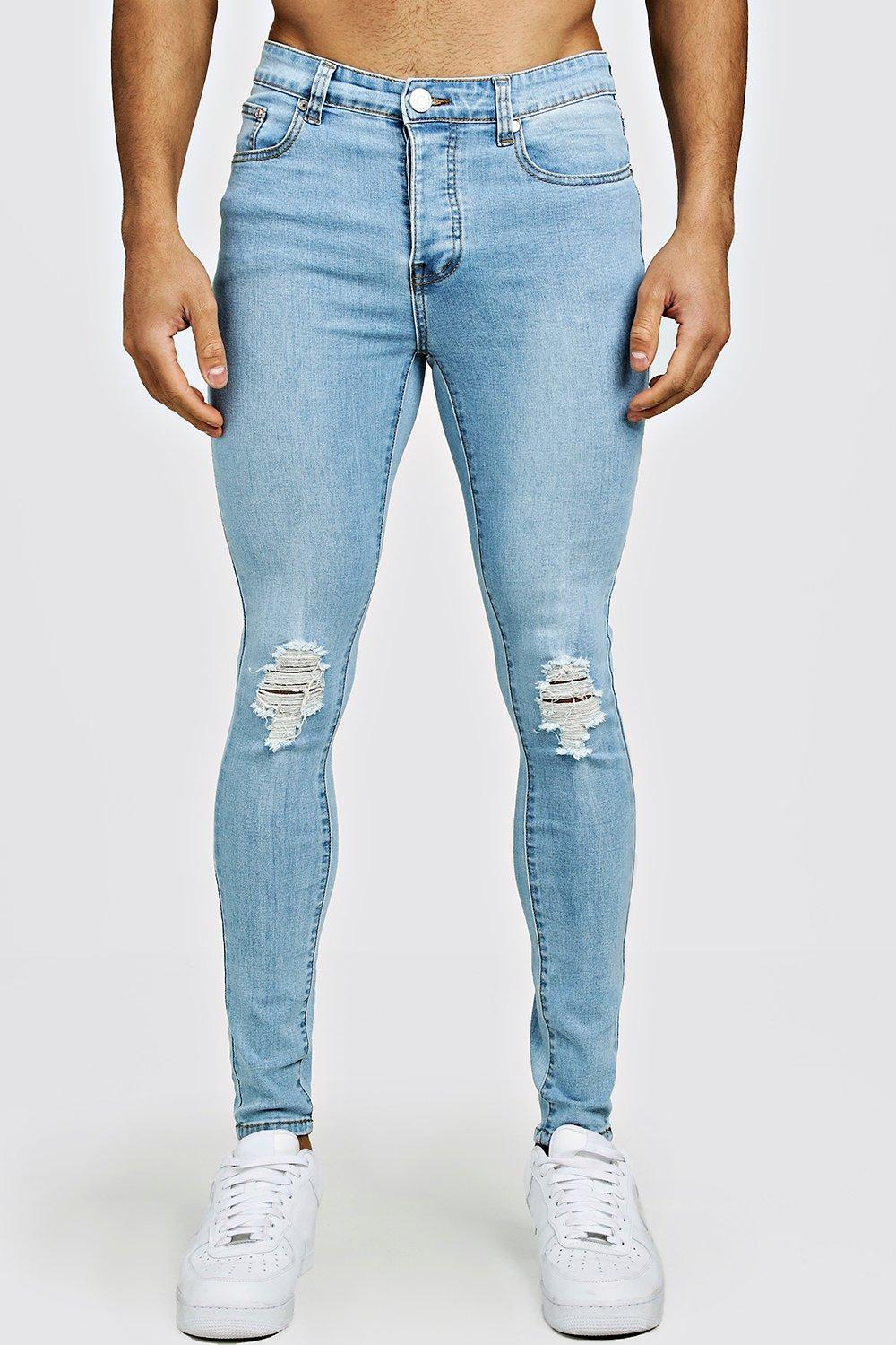 light blue ripped knee jeans