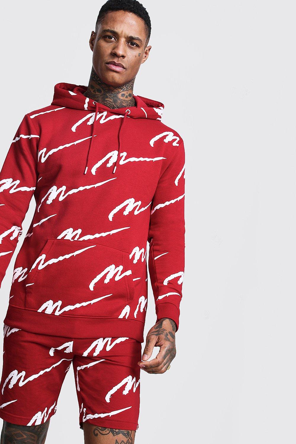 red tracksuit with white writing