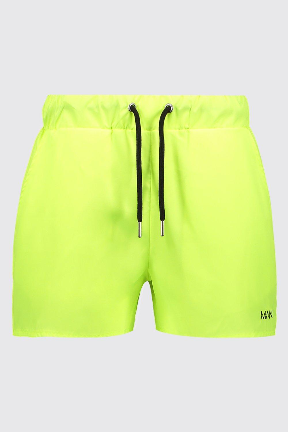 neon yellow swim shorts