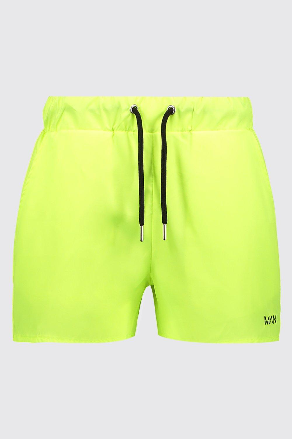 neon yellow swim shorts