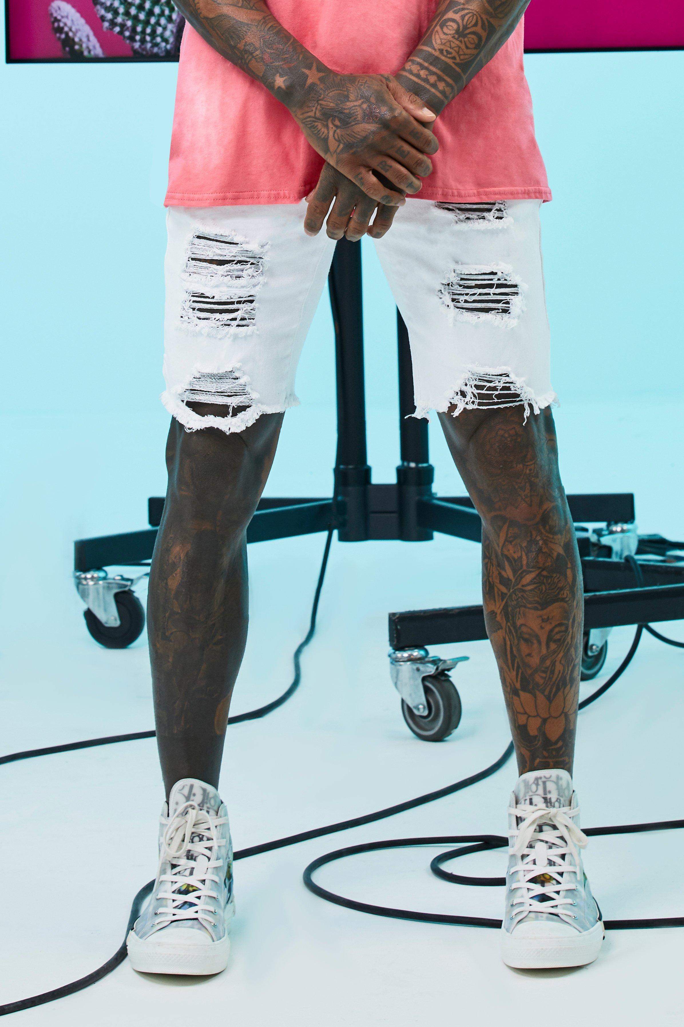 mens white distressed denim shorts