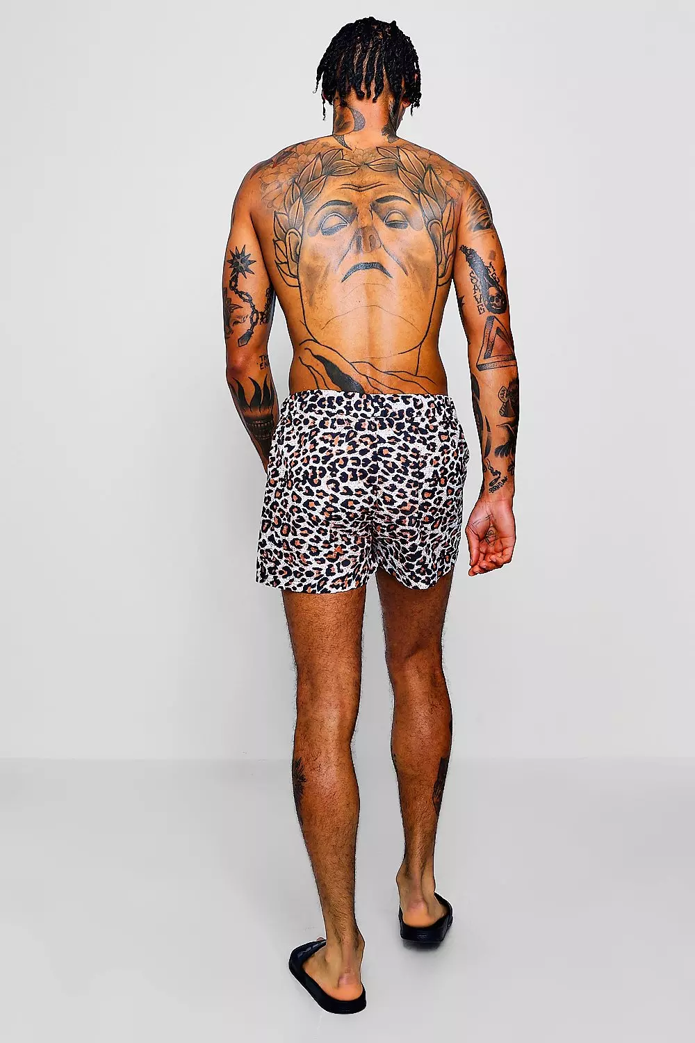 ASOS DESIGN swim briefs in leopard print