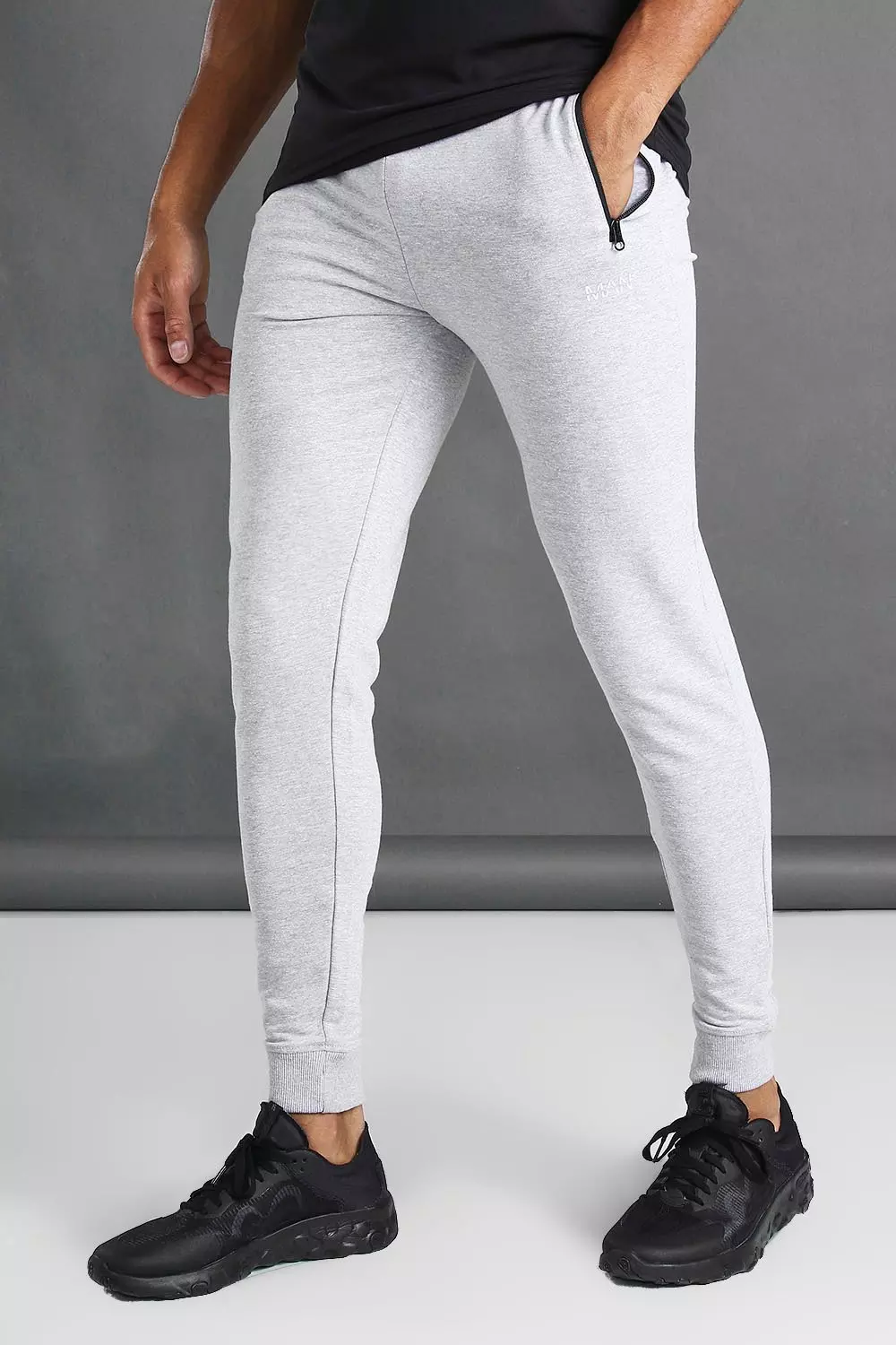 Skinny joggers with zip clearance pockets