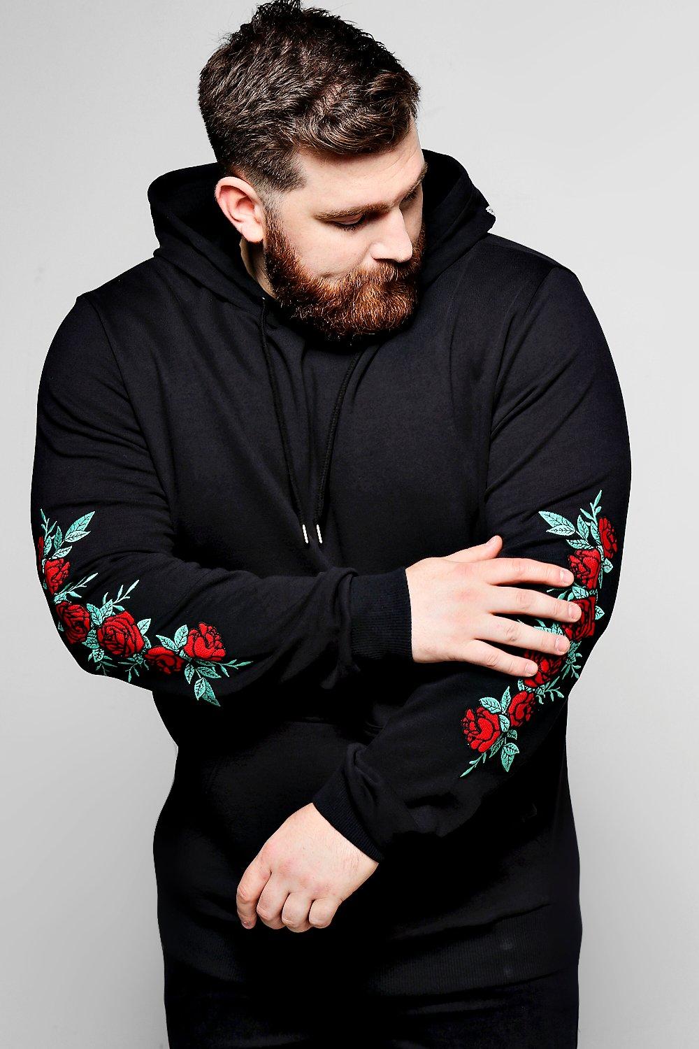 black hoodie with roses on sleeves