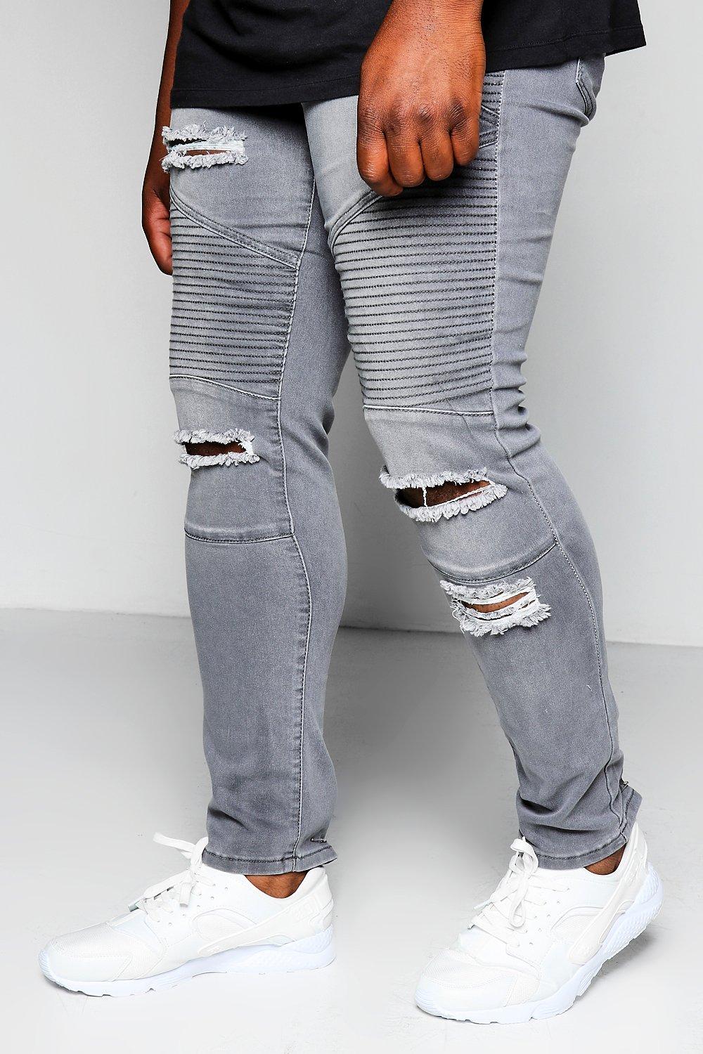grey jeans with rips