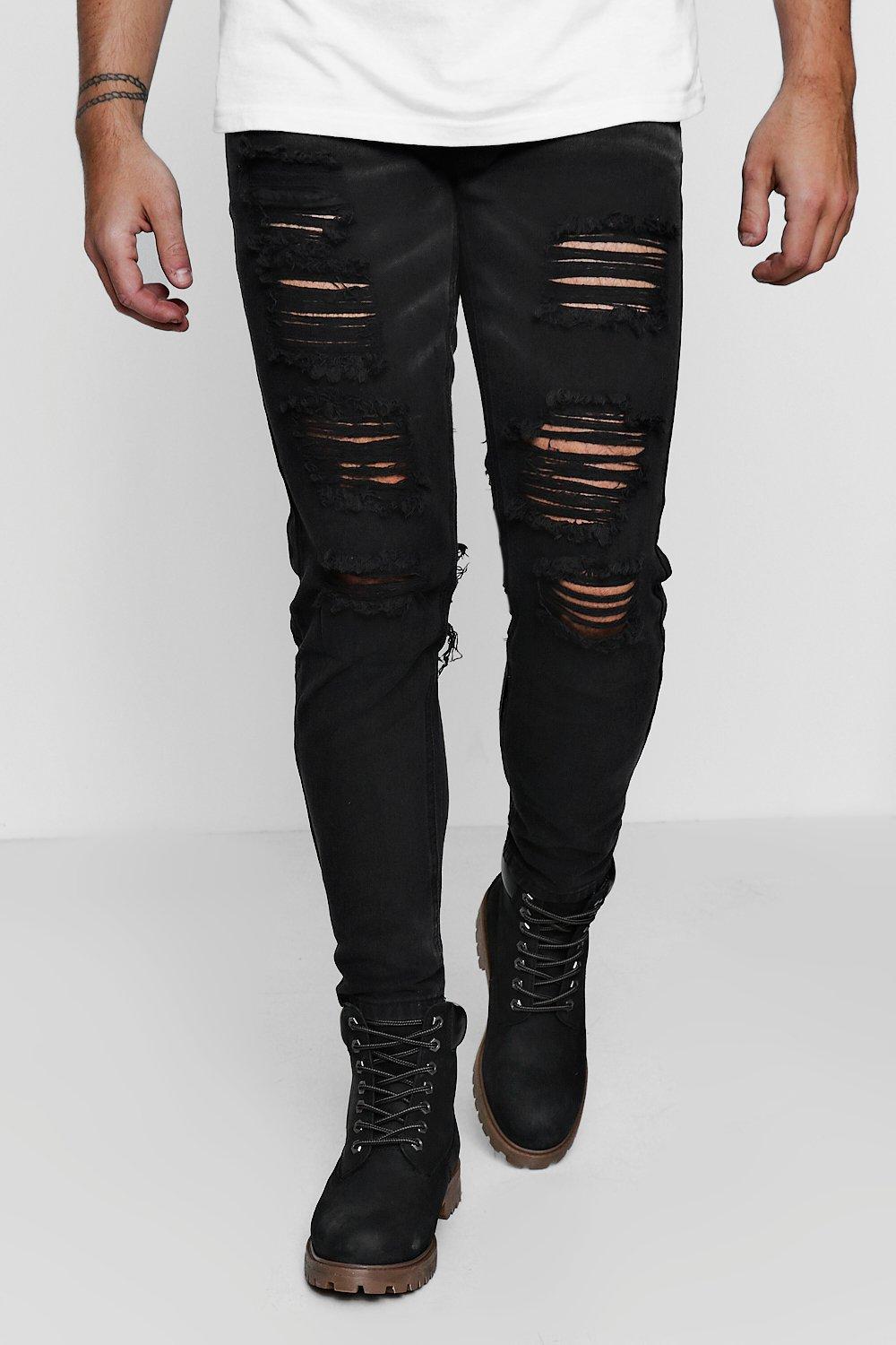 black jeans with lots of rips