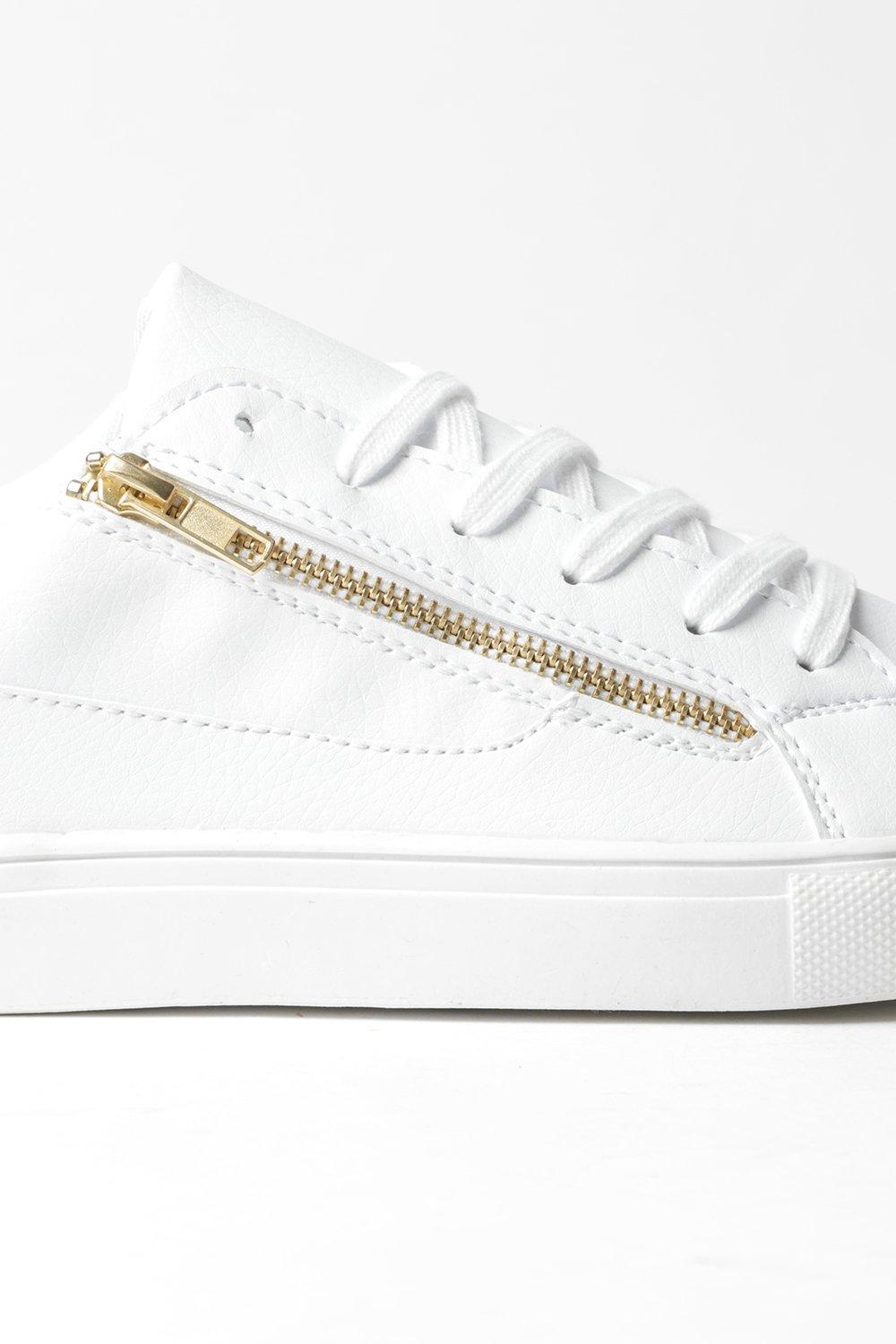 white sneakers with gold zipper