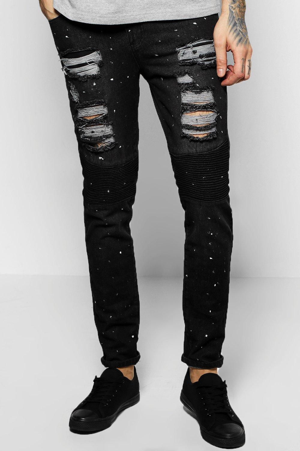 black ripped jeans with paint splatter