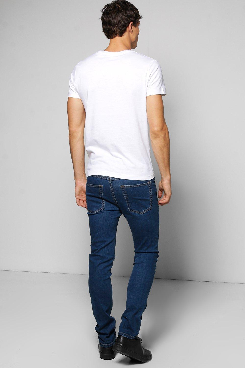 ripped jeans and polo shirt