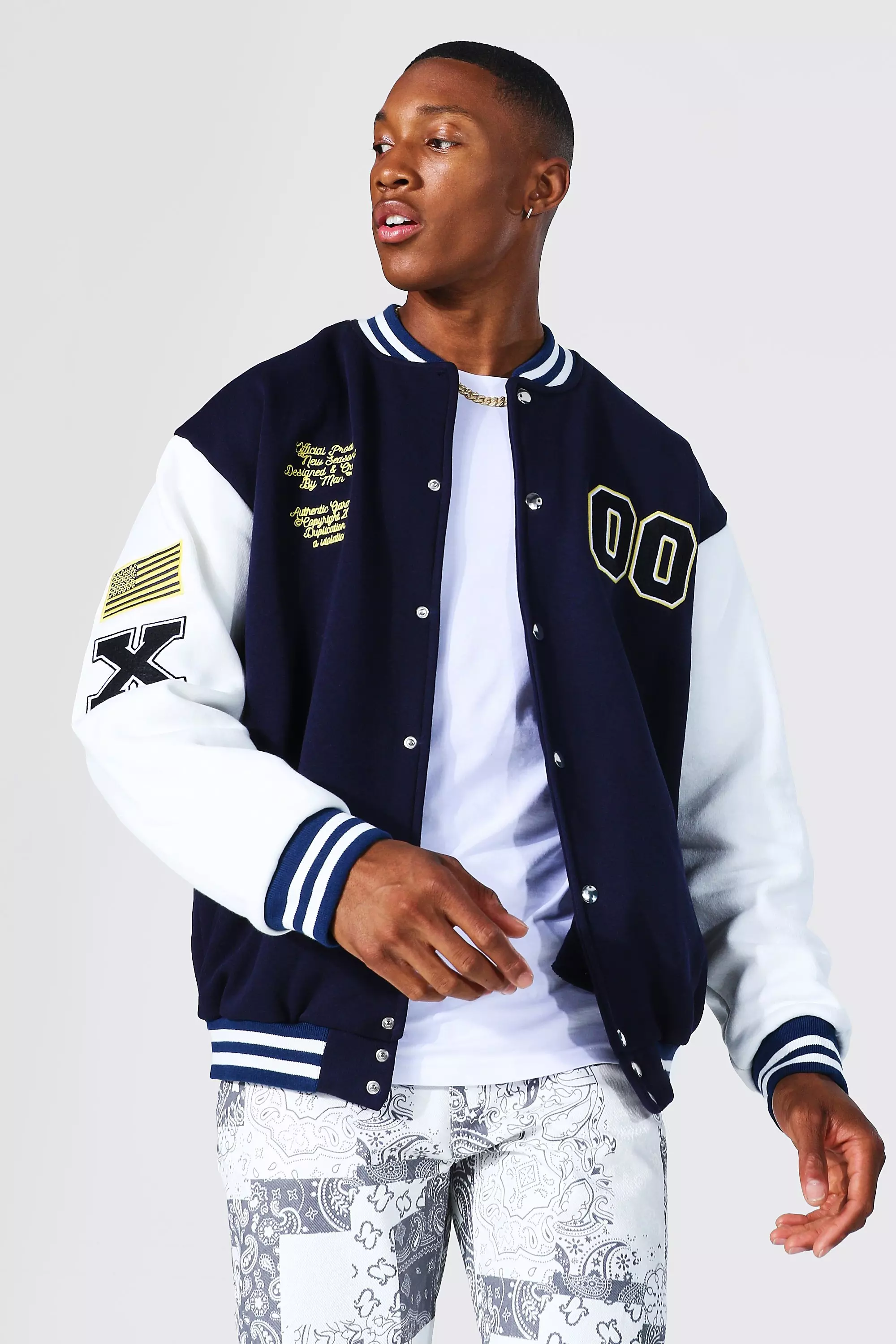 Jersey Varsity Bomber Jacket With Skull Badge | boohooMAN