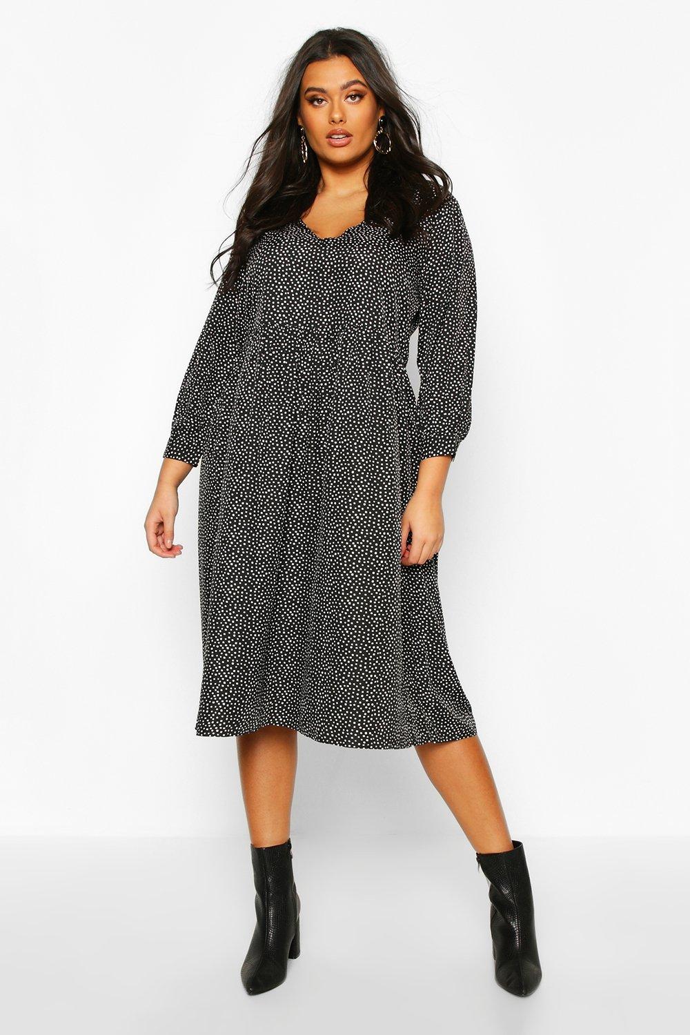 black spotty midi dress