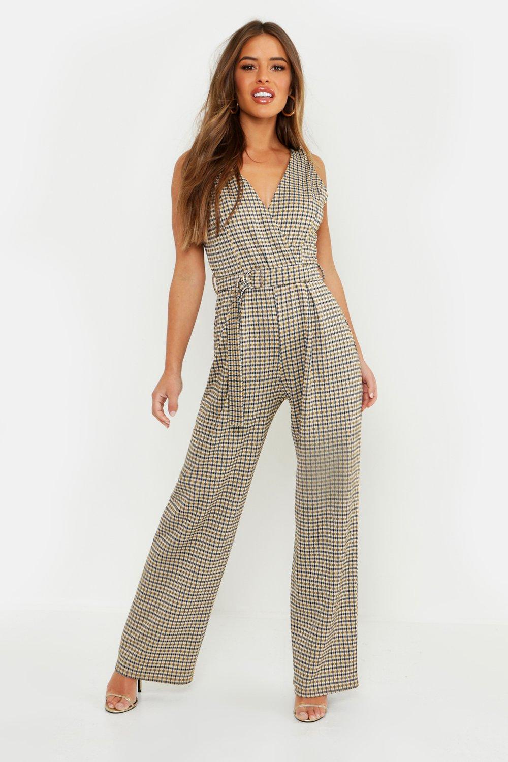 off one shoulder pierced belted wide leg jumpsuit