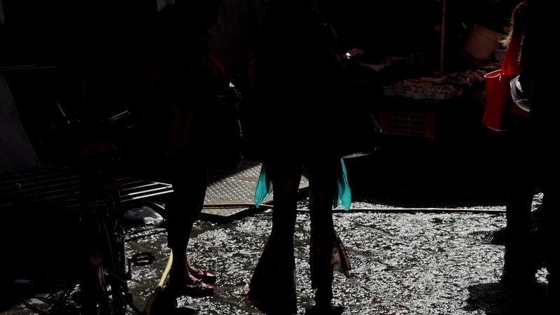 Moody black outline of the subject leaving a lot to the viewer to imagine.