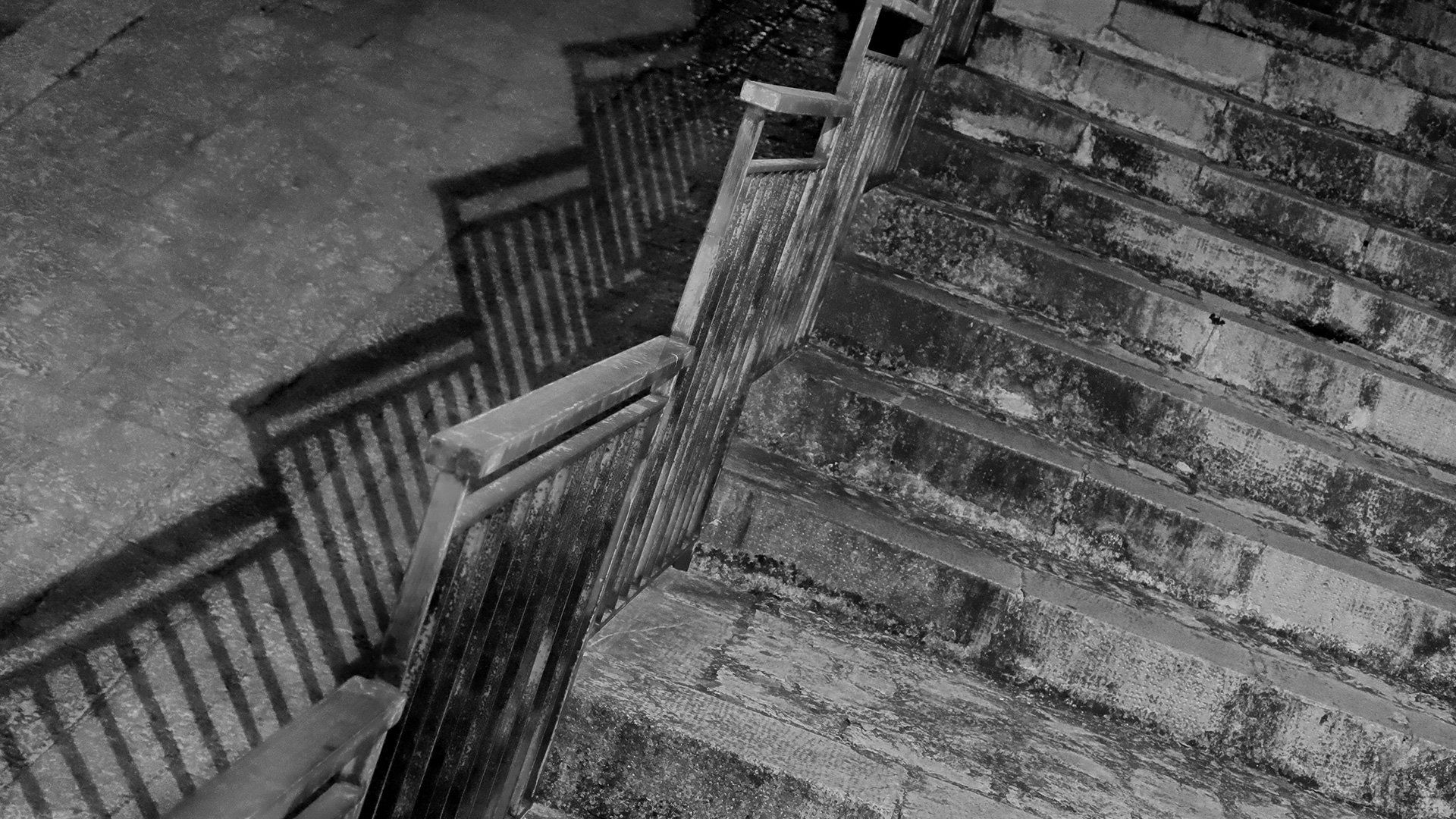 Black and white image of stairs.