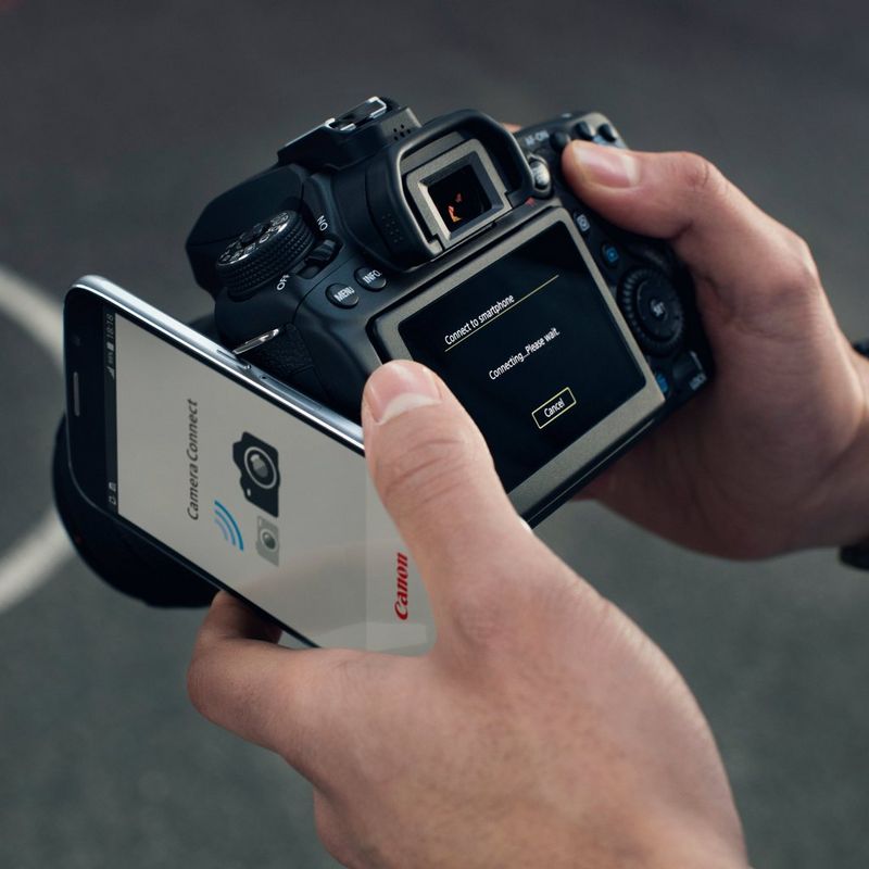 Canon EOS 80D + 18-55mm IS STM Lens Holding Camera And Changing Connectivity Settings