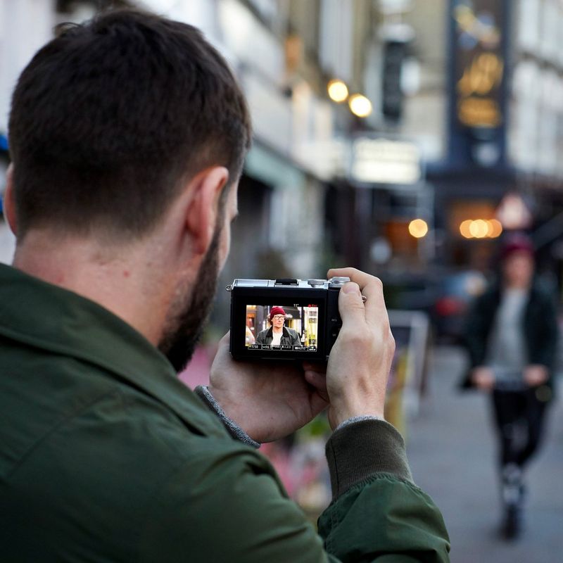 Canon EOS M6 Body - Black A Man Shooting a Video on the Street