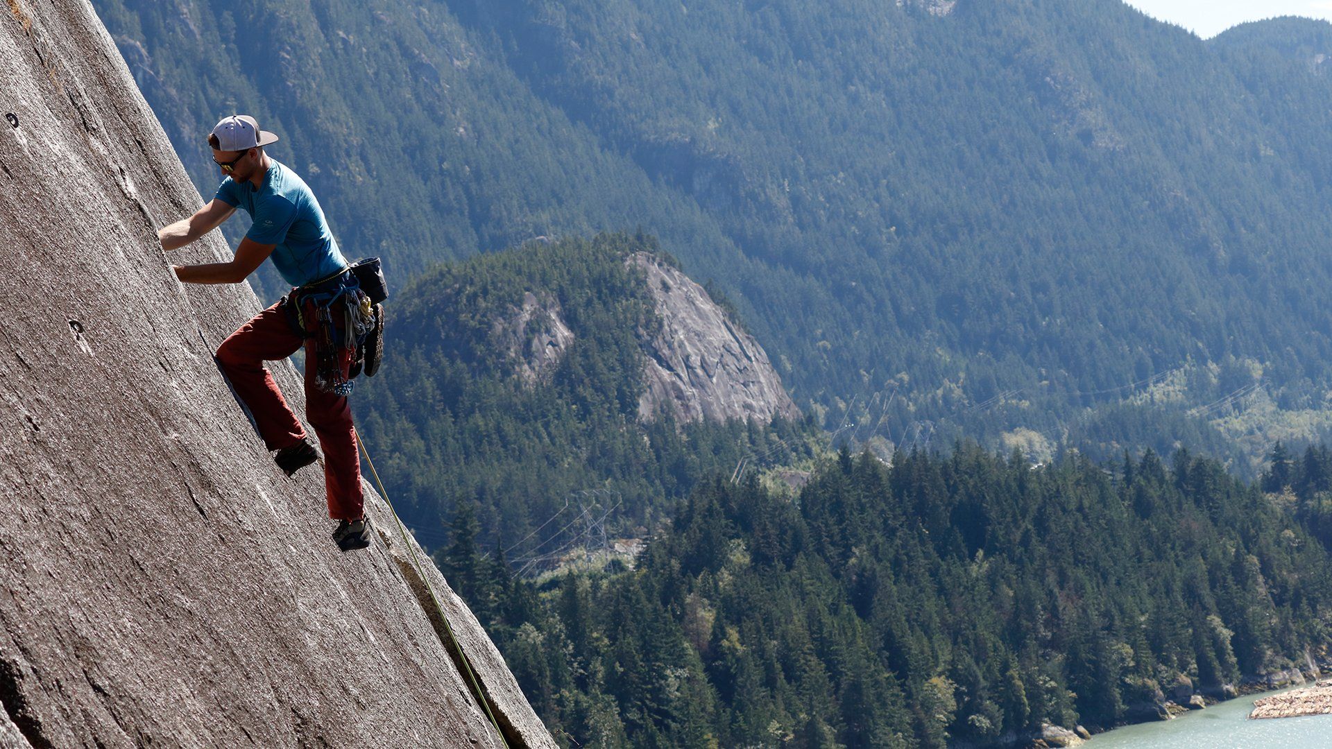 Rock climber landscape close up portrait action