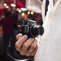 Canon PowerShot G1 X Mark III Man holding the camera
