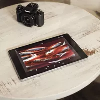 Canon PowerShot G1 X Mark III camera on a wooden table
