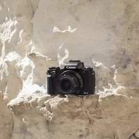 Canon PowerShot G1 X Mark III camera on the rock