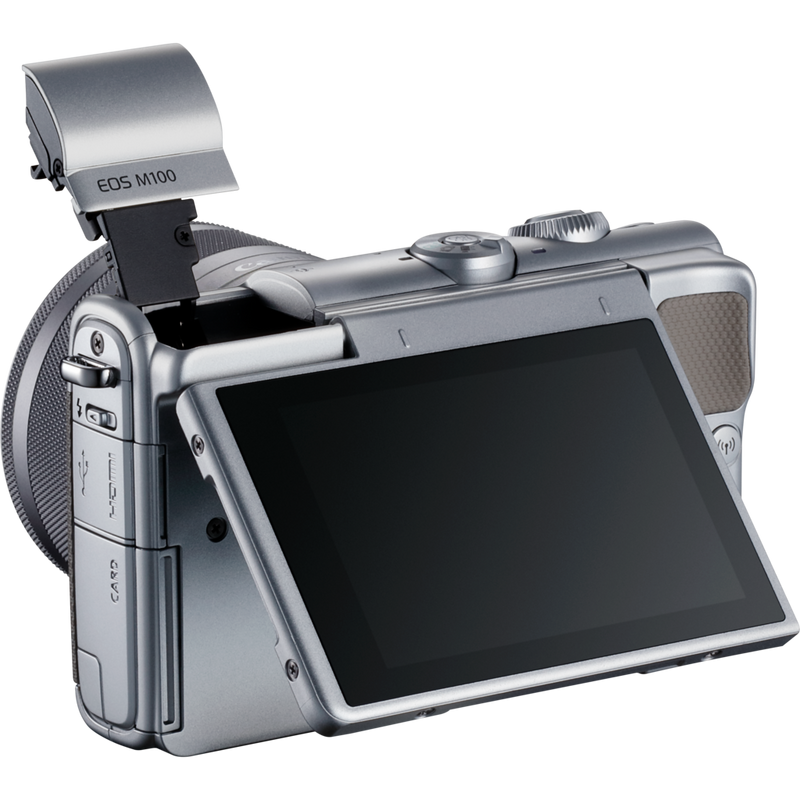 Canon EOS M100 Grey + EF-M 15-45mm f/3.5-6.3 IS STM Lens Silver Product Diagonal Back View with Built-in Flash and Tilted Screen
