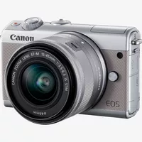 Canon EOS M100 Grey + EF-M 15-45mm f/3.5-6.3 IS STM Lens Silver Product Diagonal View with Built-in Flash