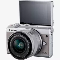 Canon EOS M100 Grey + EF-M 15-45mm f/3.5-6.3 IS STM Lens Silver Product Diagonal View with Tilted Screen
