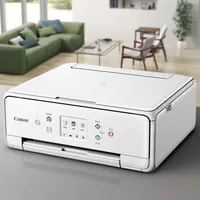 Canon PIXMA TS6151 - Blanca Sobre una mesa en una casa