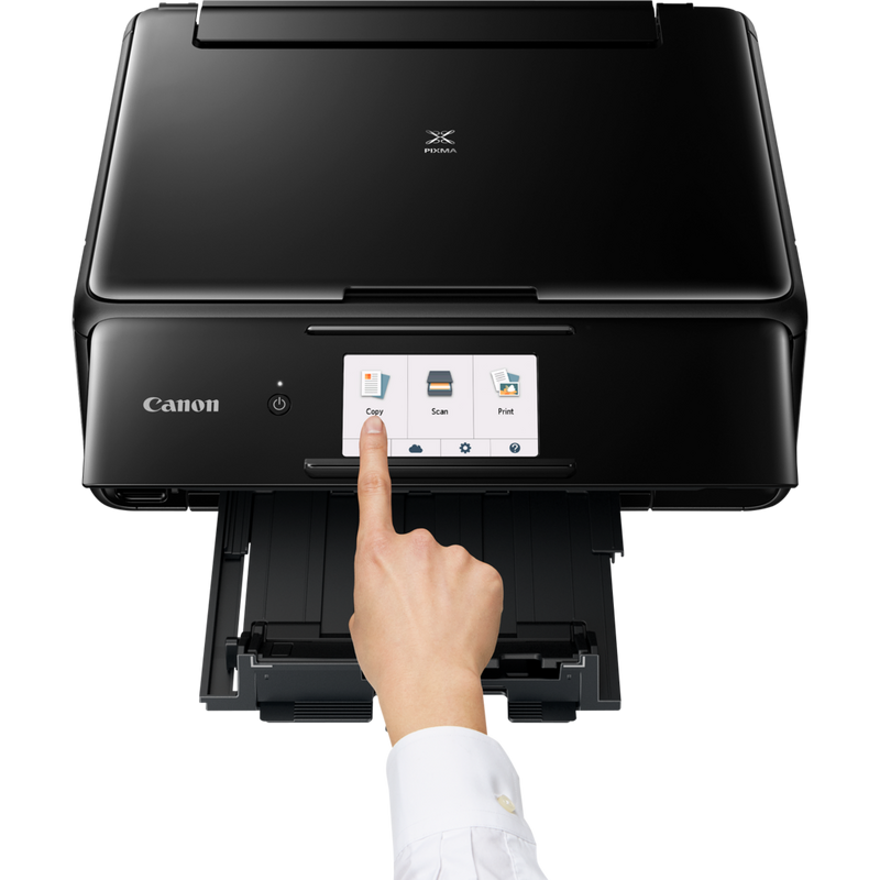 Canon PIXMA TS8150 - Black Product Front View With A Person Operating The Printer