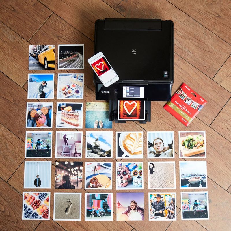 Canon PIXMA TS8150 - Black Kept On The Floor Along With Printed Images