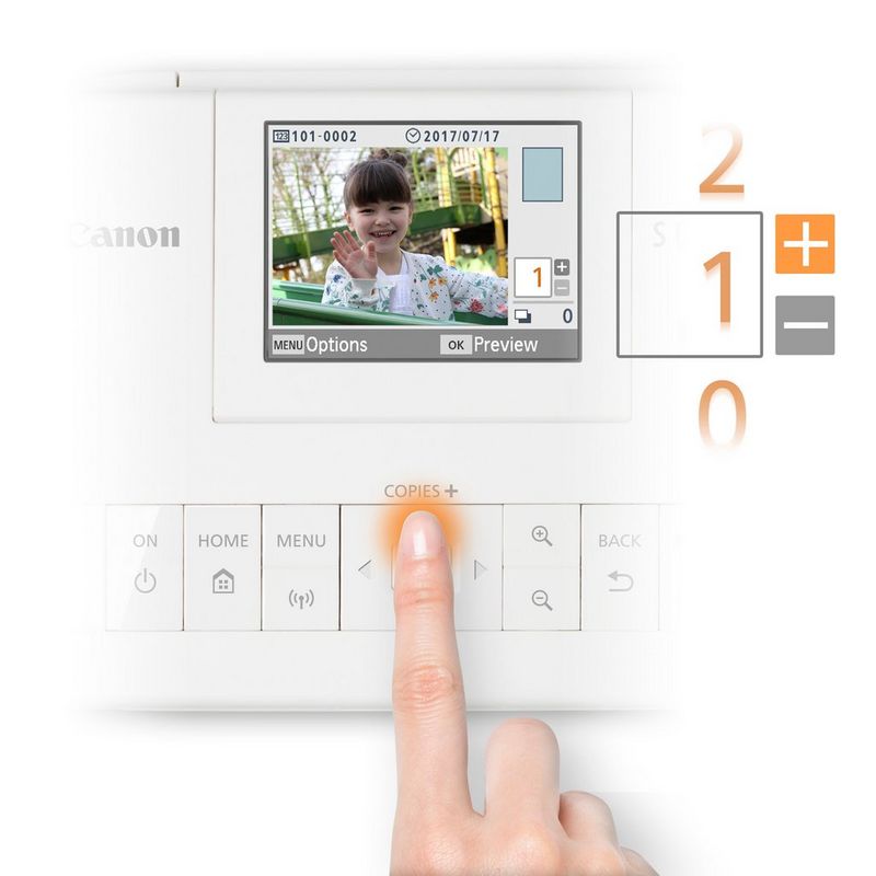 Canon SELPHY CP1300 Colour Portable Photo Printer - White Product Product with finger operating buttons