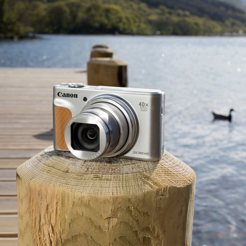 Canon PowerShot SX740 HS Lite Edition – Silver Product camera on a wooden log