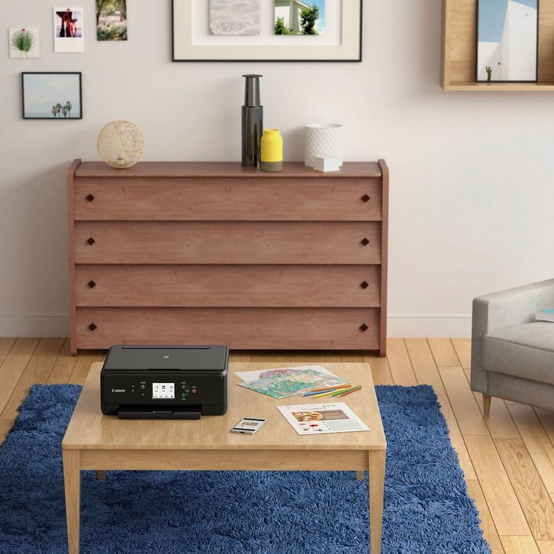 Canon PIXMA TS6250 All-In-One inkjet printer, Black  Placerad på ett bord