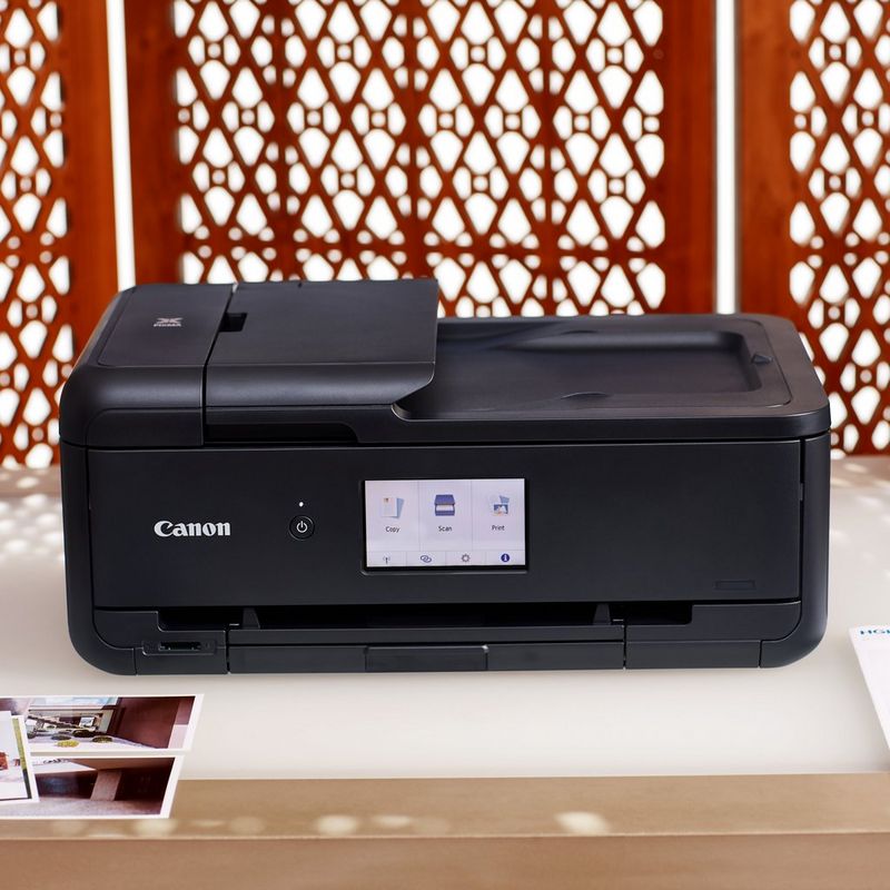 Canon PIXMA TS9550 Wireless A3 Colour All in One Inkjet Photo Printer, Black Kept On A Table