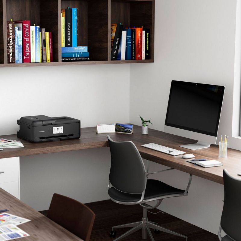 Canon PIXMA TS9550 Wireless A3 Colour All in One Inkjet Photo Printer, Black Kept On A Office Table Beside a Monitor