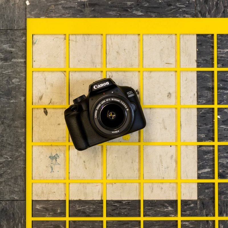 Canon EOS 4000D Body + EF-S 18-55mm III Lens Front View In Outdoor