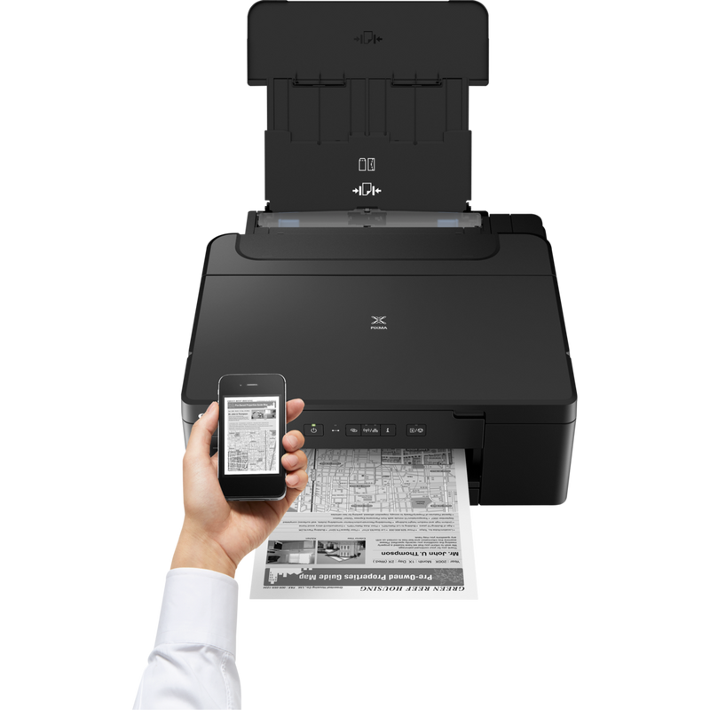 Canon PIXMA GM2040 Mono Refillable MegaTank Printer Product Front View With A Person Printing From a Smartphone
