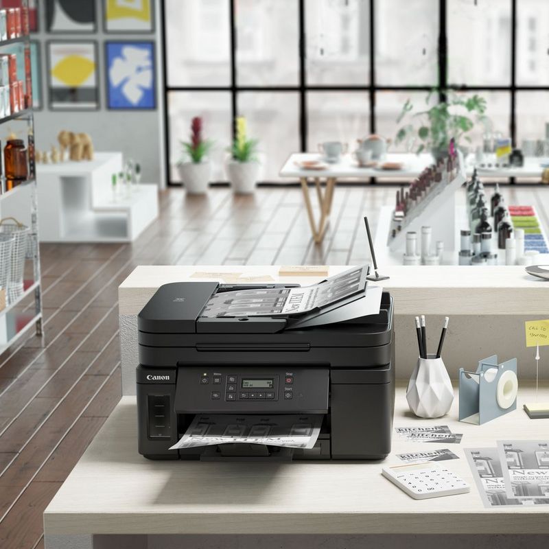 Canon PIXMA GM4050 Refillable MegaTank Inkjet Printer Kept On A Table With Paper Tray Out