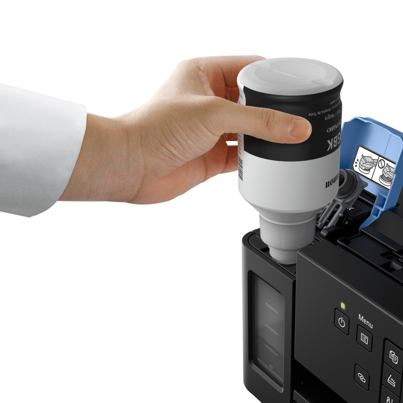 Canon PIXMA GM4040 Refillable MegaTank Inkjet Printer Product Front View with A Person Refilling the Black Ink Tank