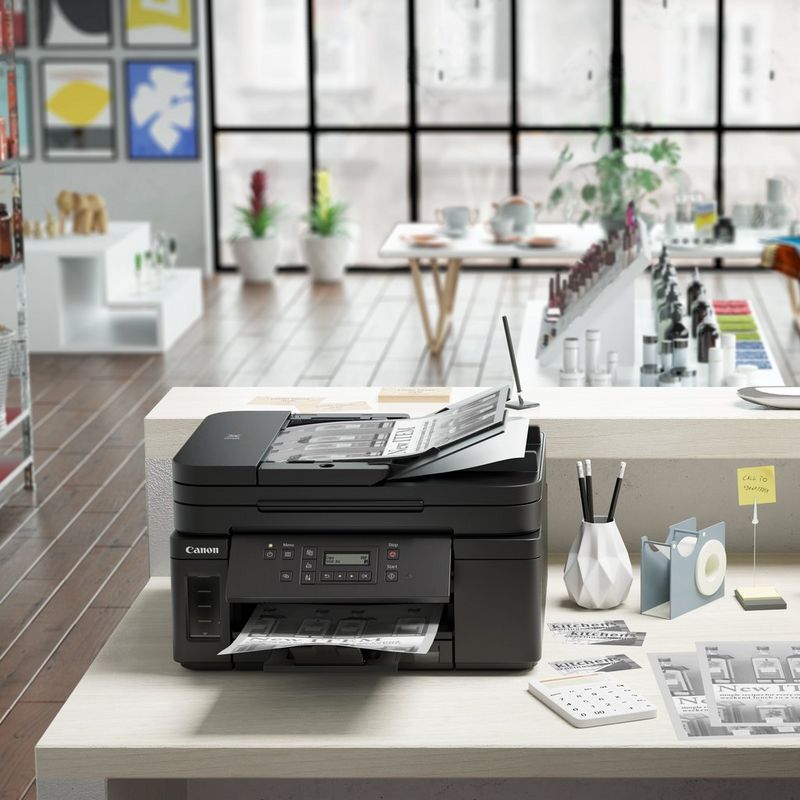 Canon PIXMA GM4040 Refillable MegaTank Inkjet Printer Kept On A Table With Paper Tray Out