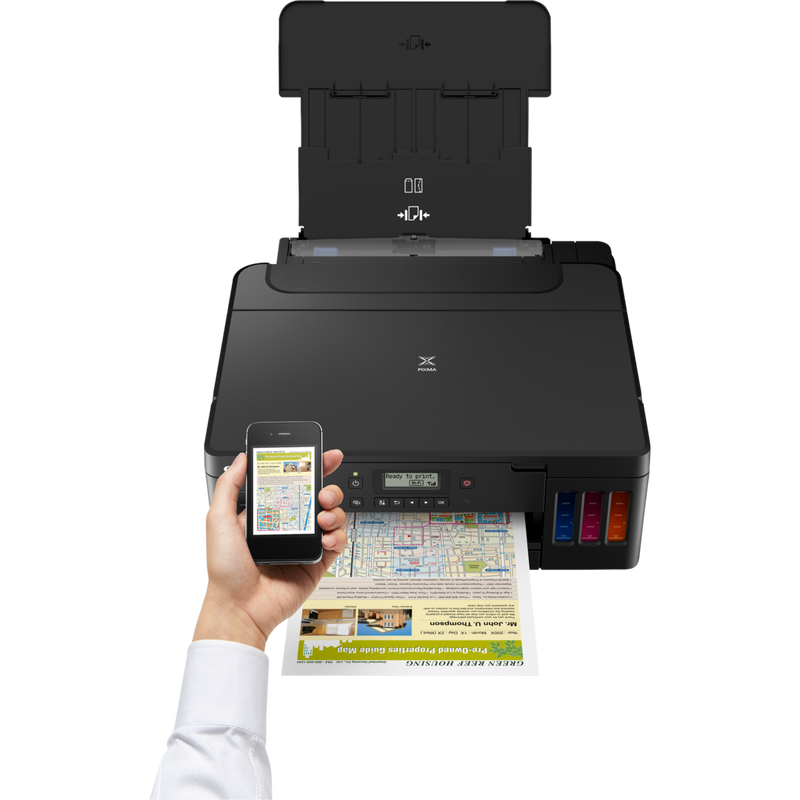Canon PIXMA G5050 Refillable MegaTank Printer Product Front View With A Person Printing From a Smartphone