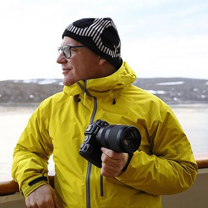 Canon EOS RP + RF 24-240mm F4-6.3 IS USM Lens A Man on a Ship Holding the Camera