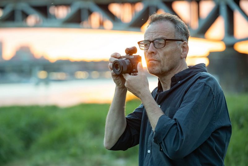 Canon EOS M6 Mark II Body A Man Holding the Camera to His Face